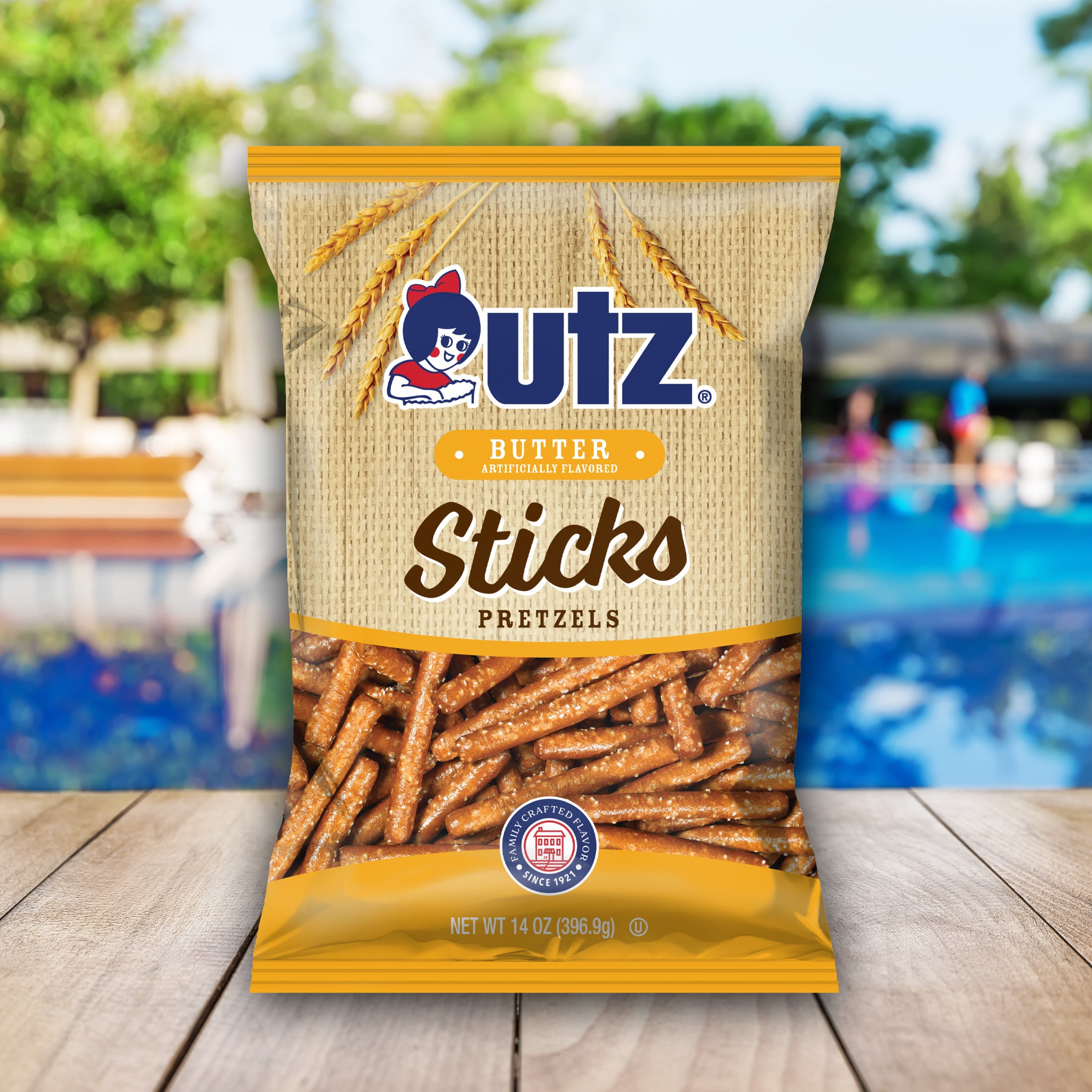 UTZ Butter Sticks Pretzels packaging with a blurred outdoor background