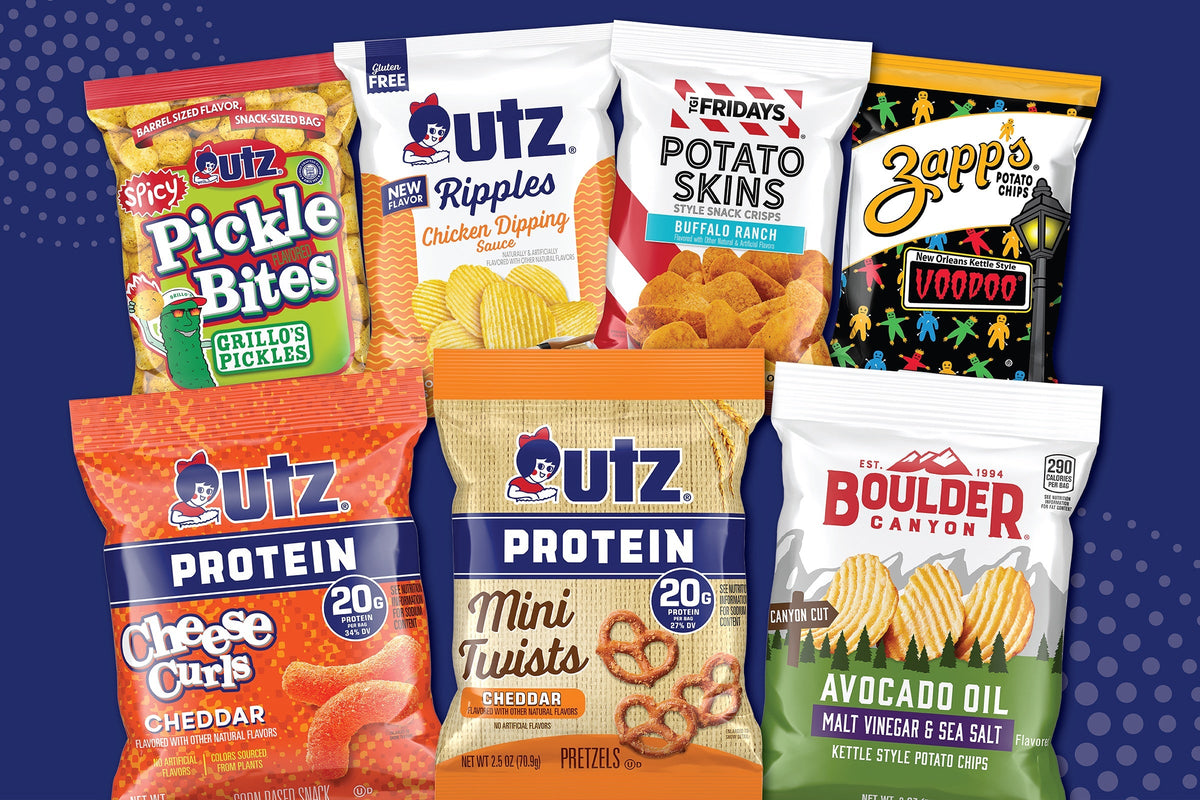 Bags of Utz Spicy Pickle Bites, Ripples Chicken Dipping Sauce, TGI Fridays Potato Skins, Zapp’s Voodoo, Utz Protein Cheese Curls and Mini Twists, and Boulder Canyon Avocado Oil chips