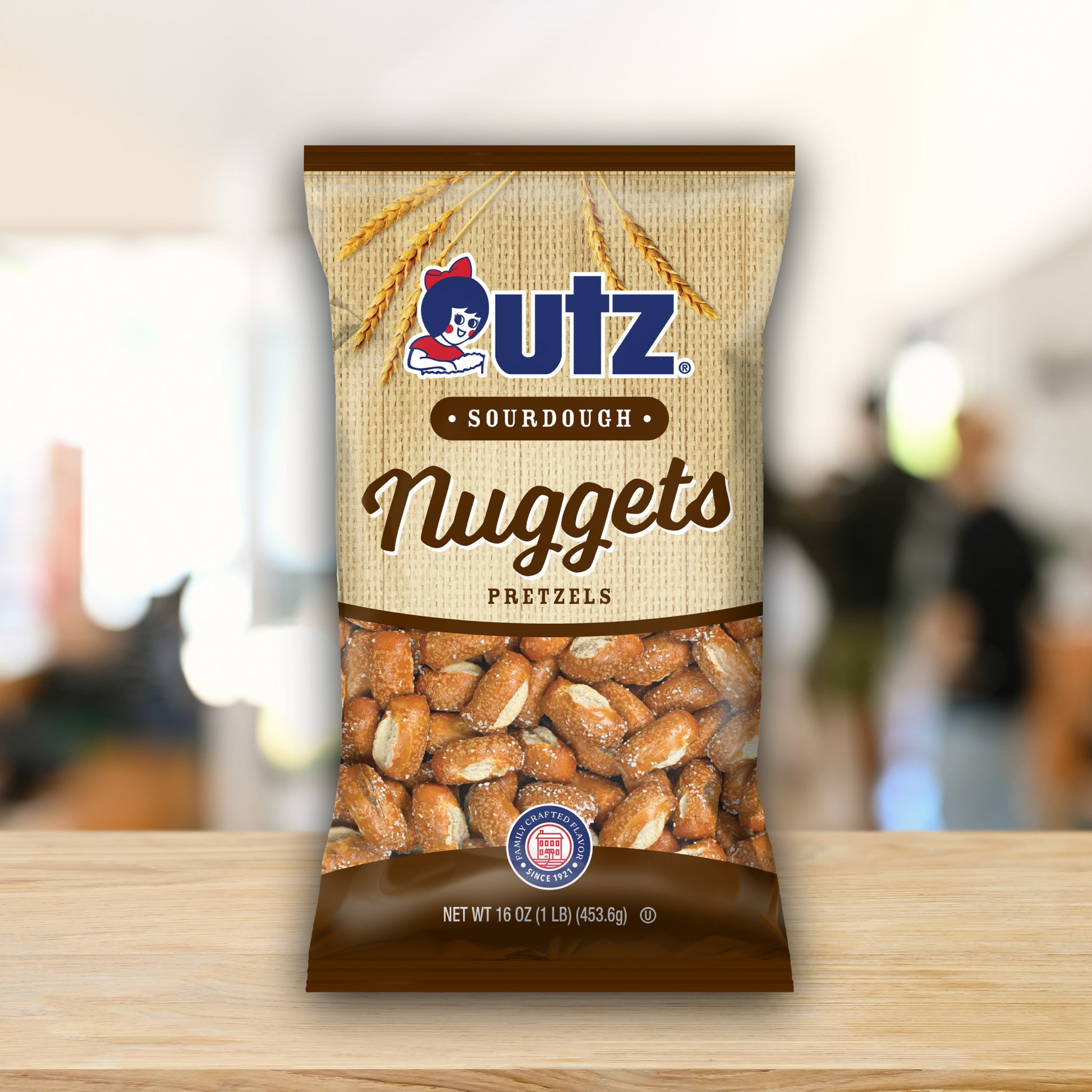 UTZ Sourdough Nuggets Pretzels packaging on a wooden surface with a blurred background