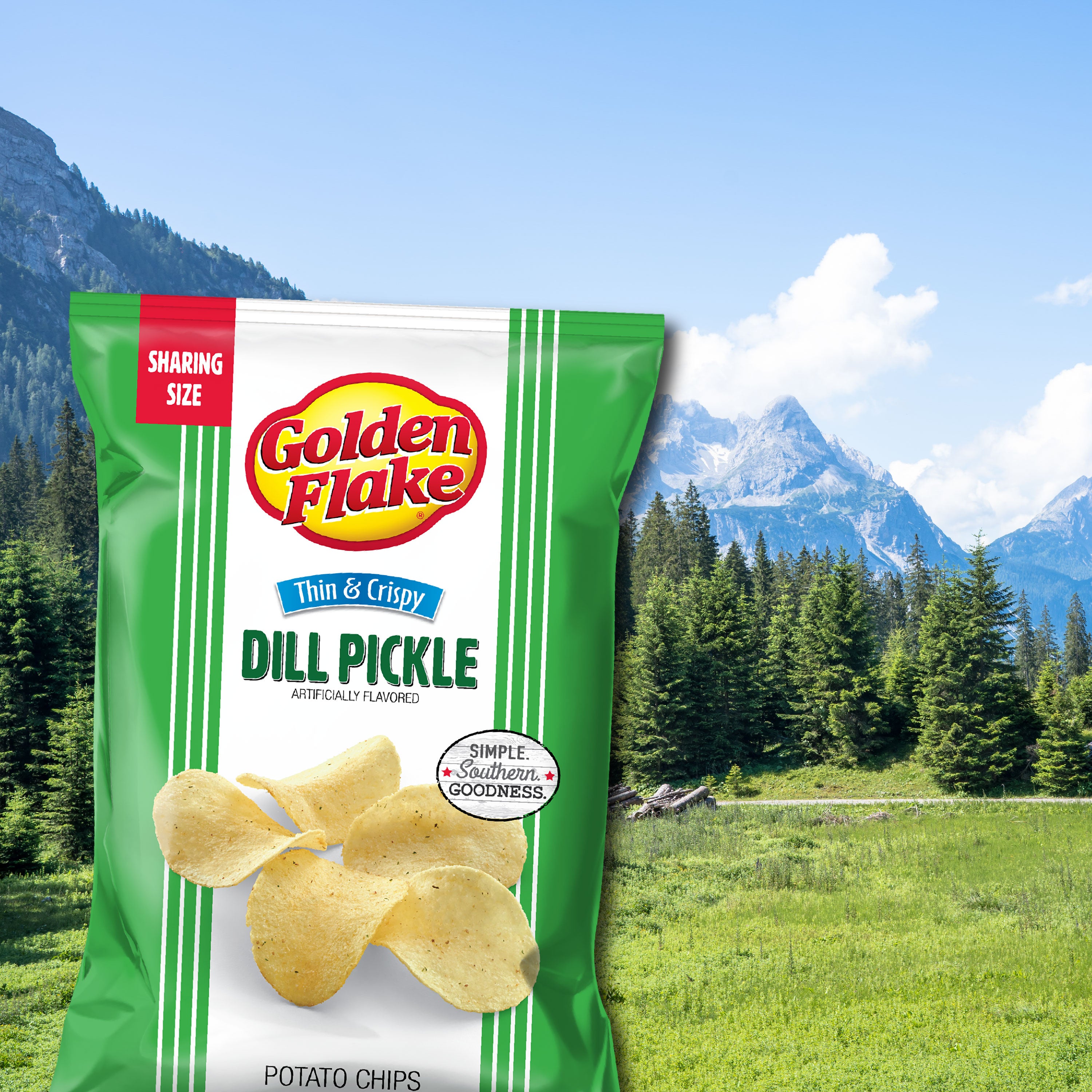 Packaging of Golden Flake Dill Pickle potato chips with a scenic background