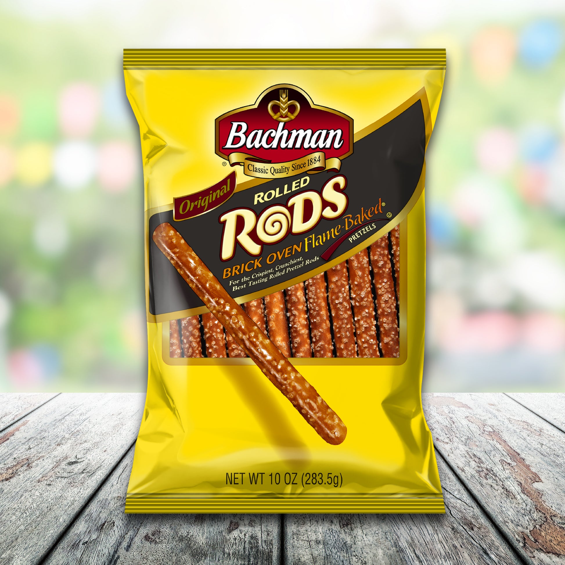 Packaged snack sticks with Bachman branding on a wooden surface