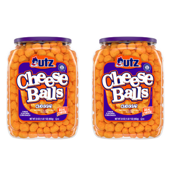 cheese balls | Two jars of Utz Cheddar Cheese Balls. Each jar is filled with orange cheese balls, and the labels indicate the product is a multipack with 2 counts, packaged in 23 oz barrels.