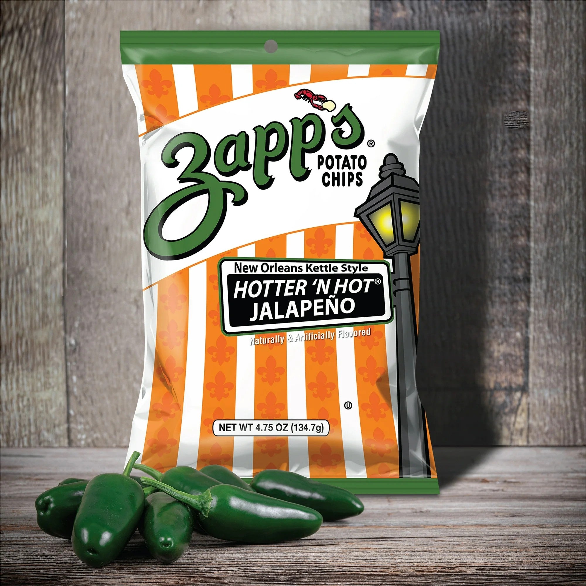 Zapp's Potato Chips Hotter 'N Hot Jalapeno flavor bag with jalapenos on a wooden surface